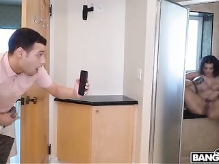 The dude shoots on the phone as a gorgeous woman masturbates in the shower