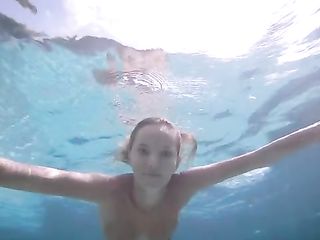 Naked Katya Clover and Putri Cinta swim in the pool
